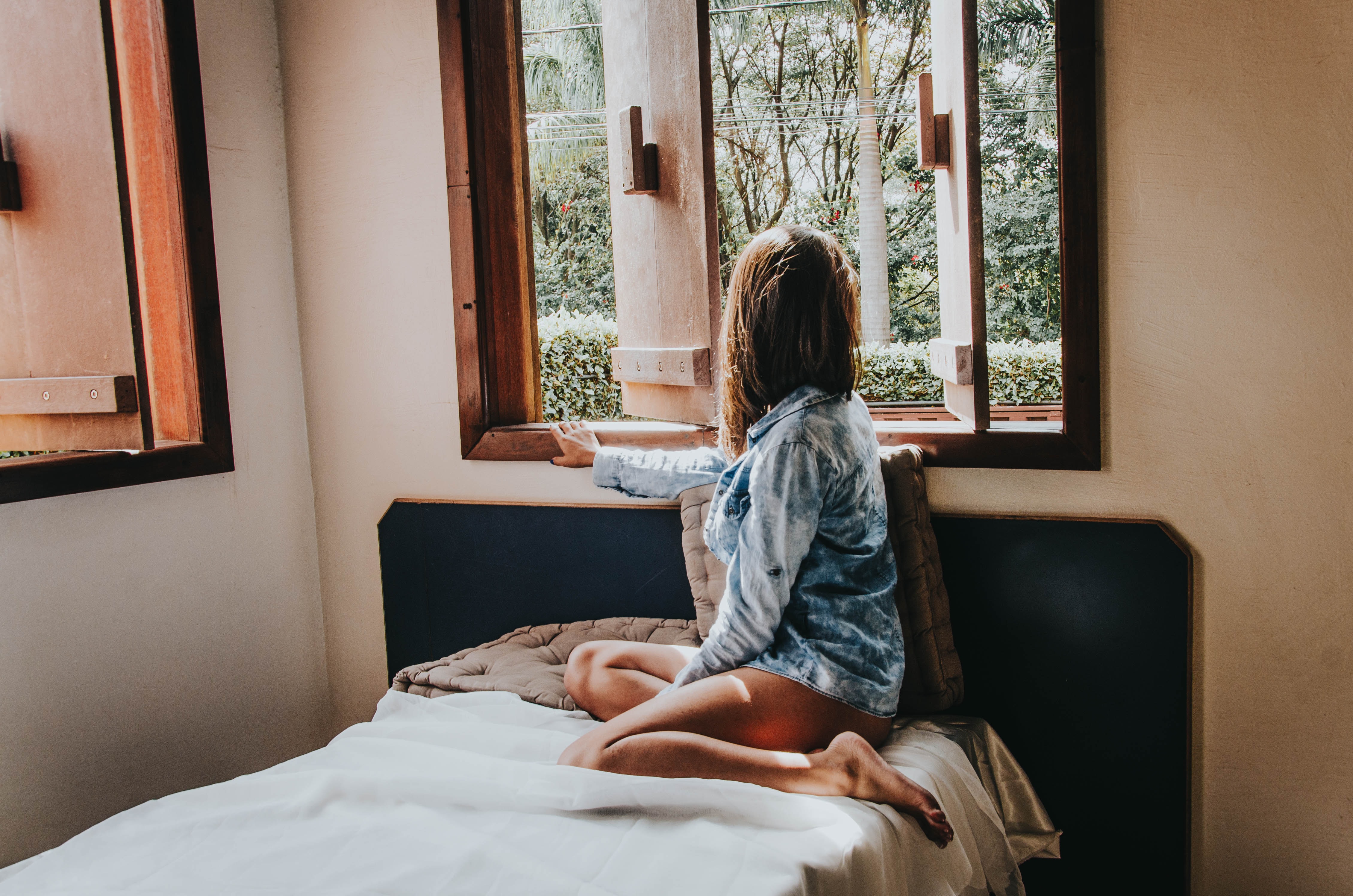 Woman stuck. Утренняя рутина картинки. Morning Routine girl. Women look out in Room Windows sitting on Bed. Morning Routine for girls describe a photo.