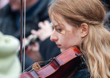 Woman playing the fiddle at Belfast Fleadh