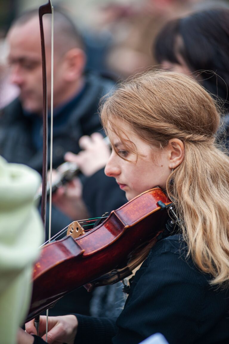 Woman playing the fiddle at Belfast Fleadh